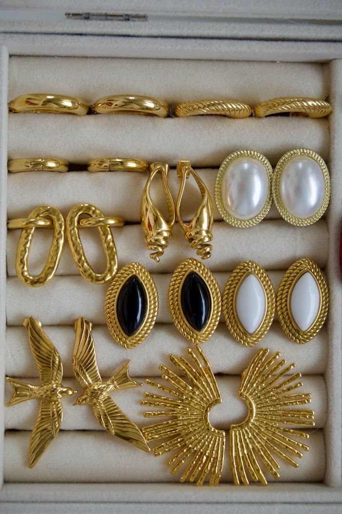 Styling imagery: a tray of inherited gold earrings in a jewellery box
