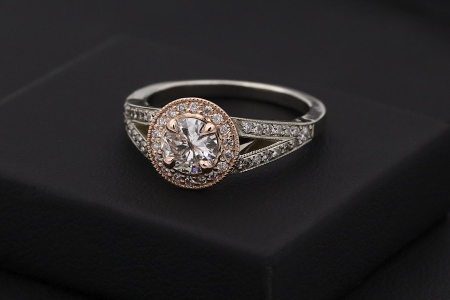 Styling imagery: a milgrain halo ring with pavé band on black velvet